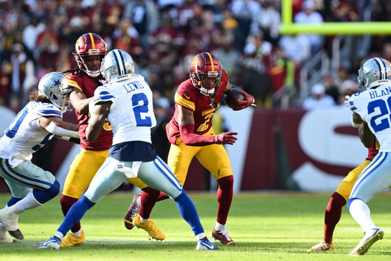 Washington Commanders wide receiver Dyami Brown (2) runs with the ball after catching a pass during the first half of an NFL football game against the Dallas Cowboys, Sunday, Nov. 24, 2024, in Landover, Md. (AP Photo/Terrance Williams)