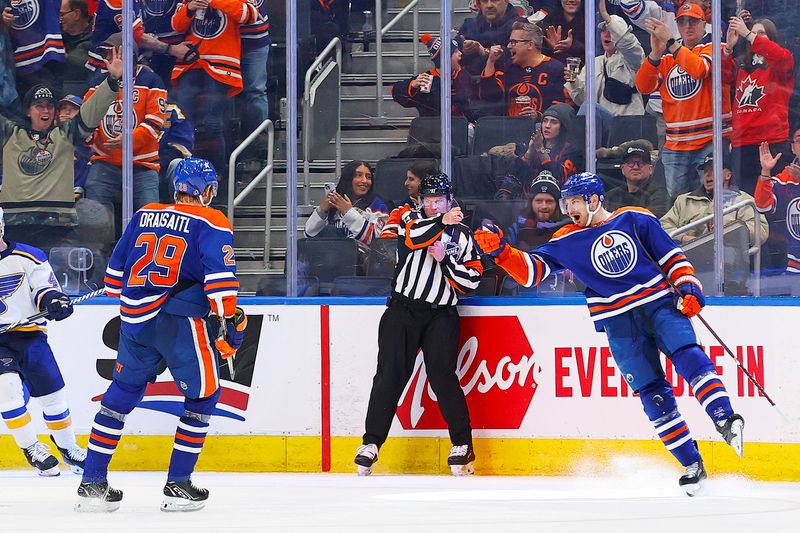 Feb 28, 2024; Edmonton, Alberta, CAN; The Edmonton Oilers celebrate a goal scored by forward Zach Hyman (18), his 40th goal of the season during the second period  against the St. Louis Blues at Rogers Place. Mandatory Credit: Perry Nelson-USA TODAY Sports