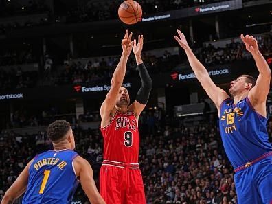DENVER, CO - NOVEMBER 4: Nikola Vucevic #9 of the Chicago Bulls shoots the ball during the game against the Denver Nuggets on November 4, 2023 at the Ball Arena in Denver, Colorado. NOTE TO USER: User expressly acknowledges and agrees that, by downloading and/or using this Photograph, user is consenting to the terms and conditions of the Getty Images License Agreement. Mandatory Copyright Notice: Copyright 2023 NBAE (Photo by Bart Young/NBAE via Getty Images)