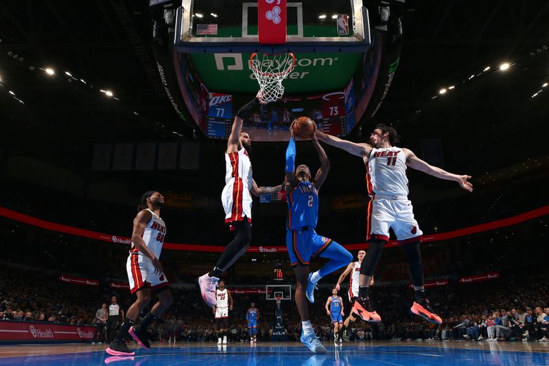 OKLAHOMA CITY, OK - MARCH 8:  Shai Gilgeous-Alexander #2 of the Oklahoma City Thunder drives to the basket during the game against the Miami Heat on March 8, 2024 at Paycom Arena in Oklahoma City, Oklahoma. NOTE TO USER: User expressly acknowledges and agrees that, by downloading and or using this photograph, User is consenting to the terms and conditions of the Getty Images License Agreement. Mandatory Copyright Notice: Copyright 2024 NBAE (Photo by Zach Beeker/NBAE via Getty Images)