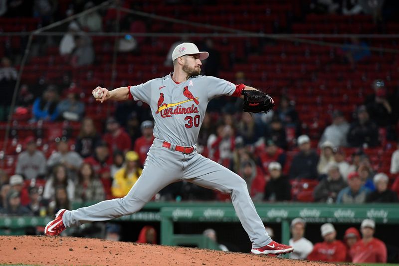 May 14, 2023; Boston, Massachusetts, USA; St. Louis Cardinals relief pitcher Chris Stratton (30) pitches against the Boston Red Sox during the ninth inning at Fenway Park. Mandatory Credit: Eric Canha-USA TODAY Sports