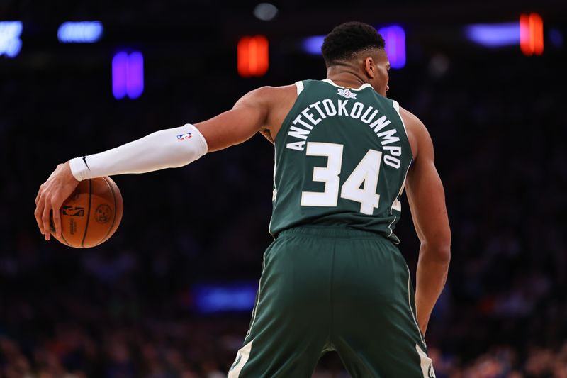 NEW YORK, NEW YORK - DECEMBER 25: Giannis Antetokounmpo #34 of the Milwaukee Bucks dribbles during the third quarter against the New York Knicks at Madison Square Garden on December 25, 2023 in New York City.  NOTE TO USER: User expressly acknowledges and agrees that, by downloading and or using this photograph, User is consenting to the terms and conditions of the Getty Images License Agreement. (Photo by Rich Graessle/Getty Images)