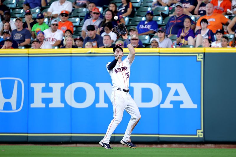 Aug 24, 2023; Houston, Texas, USA; Houston Astros right fielder Kyle Tucker (30) catches a fly ball for an out against the Boston Red Sox during the fifth inning at Minute Maid Park. Mandatory Credit: Erik Williams-USA TODAY Sports
