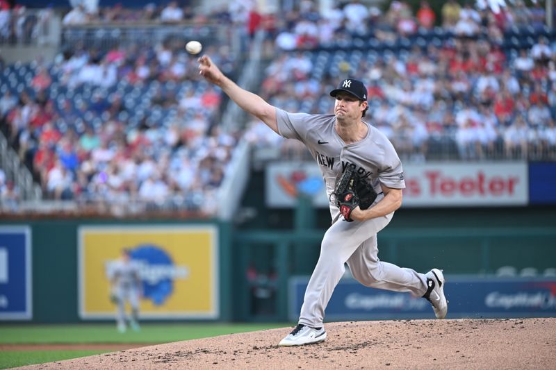 Aug 27, 2024; Washington, District of Columbia, USA; New York Yankees starting pitcher Gerrit Cole (45) throws a pitch against the Washington Nationals during the first inning at Nationals Park. Mandatory Credit: Rafael Suanes-USA TODAY Sports