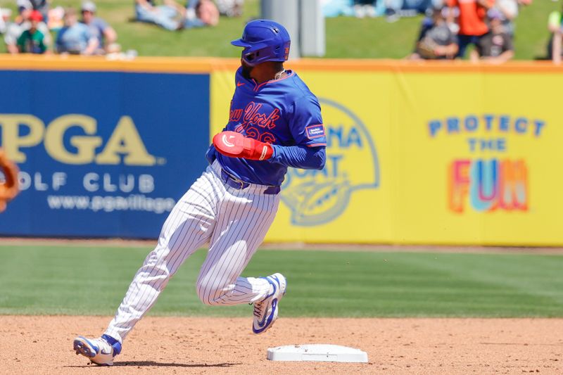Mar 17, 2025; Port St. Lucie, Florida, USA;  New York Mets third baseman Luis De Los Santos rounds second base during the third inning against the Tampa Bay Rays at Clover Park. Mandatory Credit: Reinhold Matay-Imagn Images Mandatory Credit: Reinhold Matay-Imagn Images