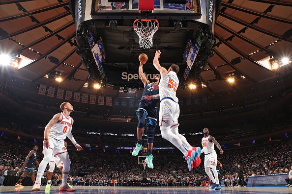 NEW YORK, NY - JANUARY 1: Rudy Gobert #27 of the Minnesota Timberwolves drives to the basket during the game against the New York Knicks on January 1, 2024 at Madison Square Garden in New York City, New York.  NOTE TO USER: User expressly acknowledges and agrees that, by downloading and or using this photograph, User is consenting to the terms and conditions of the Getty Images License Agreement. Mandatory Copyright Notice: Copyright 2024 NBAE  (Photo by Nathaniel S. Butler/NBAE via Getty Images)