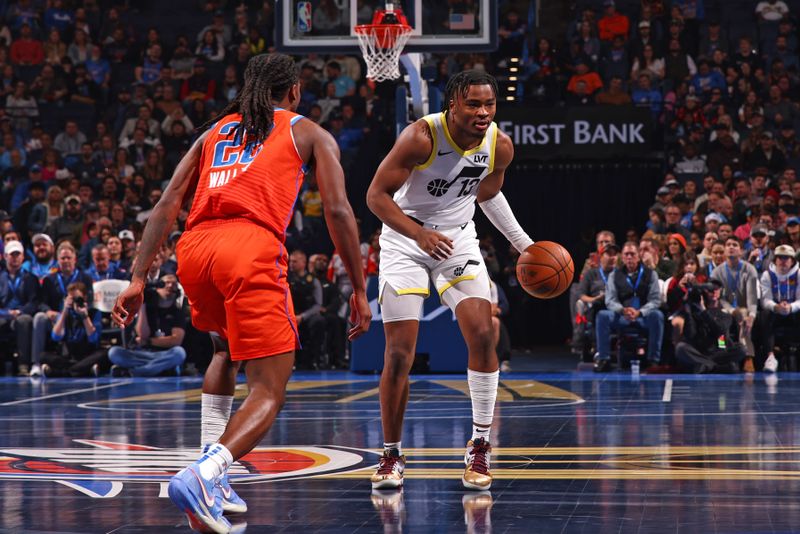 OKLAHOMA CITY, OK - DECEMBER 3: Isaiah Collier #13 of the Utah Jazz handles the ball during the game against the Oklahoma City Thunder during the Emirates NBA Cup game on on December 3, 2024 at Paycom Center in Oklahoma City, Oklahoma. NOTE TO USER: User expressly acknowledges and agrees that, by downloading and or using this photograph, User is consenting to the terms and conditions of the Getty Images License Agreement. Mandatory Copyright Notice: Copyright 2024 NBAE (Photo by Zach Beeker/NBAE via Getty Images)