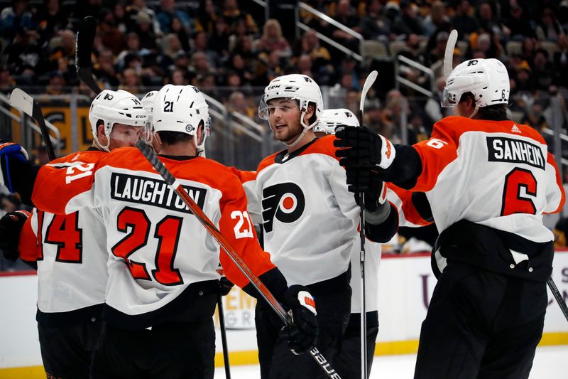 Feb 25, 2024; Pittsburgh, Pennsylvania, USA;  The Philadelphia Flyers celebrate a goal by Philadelphia Flyers right wing Tyson Foerster (middle) against the Pittsburgh Penguins during the third period at PPG Paints Arena. Pittsburgh won 7-6. Mandatory Credit: Charles LeClaire-USA TODAY Sports