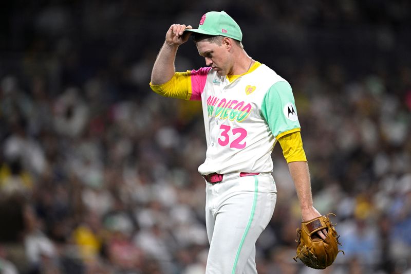 Jun 21, 2024; San Diego, California, USA; San Diego Padres relief pitcher Stephen Kolek (32) walks to the dugout during the seventh inning against the Milwaukee Brewers at Petco Park. Mandatory Credit: Orlando Ramirez-USA TODAY Sports