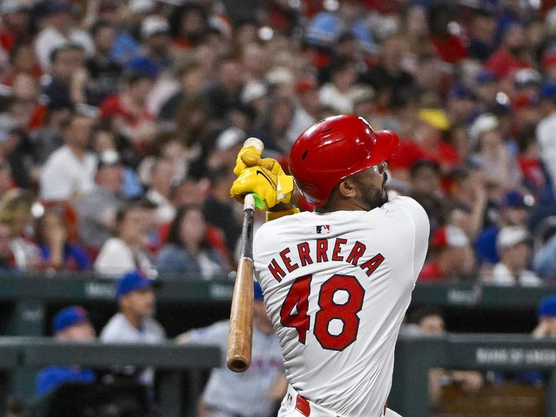 May 6, 2024; St. Louis, Missouri, USA;  St. Louis Cardinals designated hitter Ivan Herrera (48) hits a two run double against the New York Mets during the sixth inning at Busch Stadium. Mandatory Credit: Jeff Curry-USA TODAY Sports