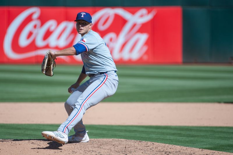 Sep 26, 2024; Oakland, California, USA; Texas Rangers pitcher Jack Leiter (35) throws a pitch during the ninth inning against the Oakland Athletics at Oakland-Alameda County Coliseum. Mandatory Credit: Ed Szczepanski-Imagn Images