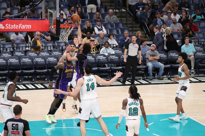 MEMPHIS, TN - NOVEMBER 6: Jaxson Hayes #11 of the Los Angeles Lakers drives to the basket during the game against the Memphis Grizzlies on November 6, 2024 at FedExForum in Memphis, Tennessee. NOTE TO USER: User expressly acknowledges and agrees that, by downloading and or using this photograph, User is consenting to the terms and conditions of the Getty Images License Agreement. Mandatory Copyright Notice: Copyright 2024 NBAE (Photo by Joe Murphy/NBAE via Getty Images)