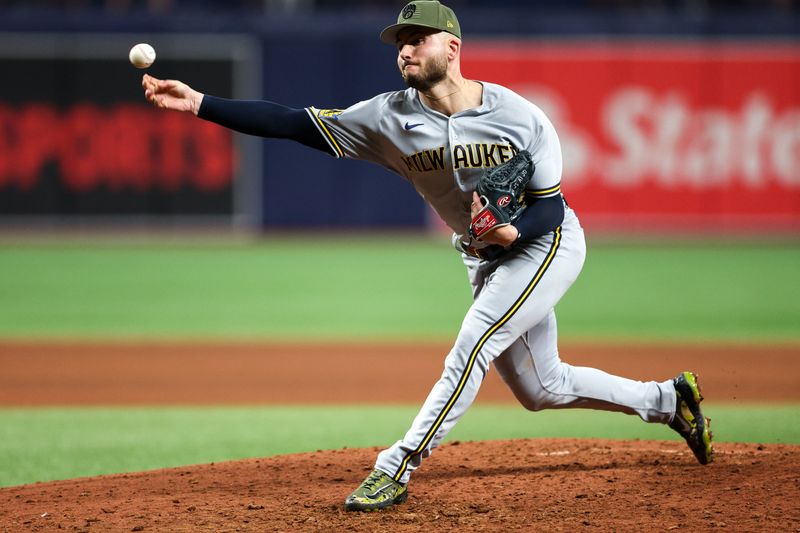 May 19, 2023; St. Petersburg, Florida, USA;  Milwaukee Brewers relief pitcher Peter Strzelecki (32) throws a pitch  against the Tampa Bay Rays in the eighth inning at Tropicana Field. Mandatory Credit: Nathan Ray Seebeck-USA TODAY Sports