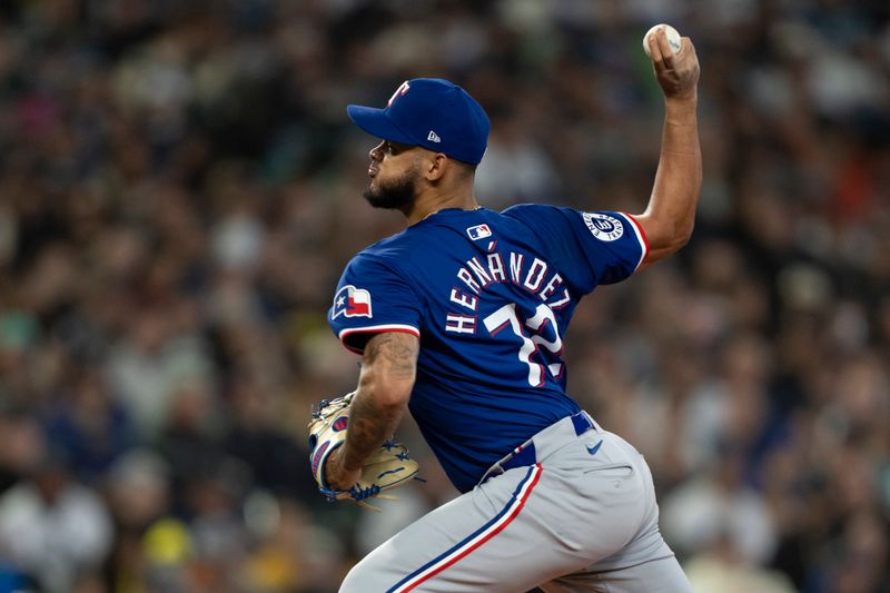 Jun 15, 2024; Seattle, Washington, USA; Texas Rangers reliever Jonathan Hernandez (72) delivers a pitch during the sixth inning against the Seattle Mariners at T-Mobile Park. Mandatory Credit: Stephen Brashear-USA TODAY Sports