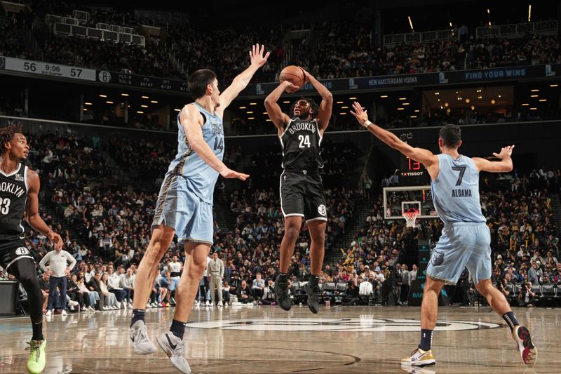 BROOKLYN, NY - NOVEMBER 4: Cam Thomas #24 of the Brooklyn Nets shoots a three point basket during the game  against the Memphis Grizzlies on November 4, 2024 at Barclays Center in Brooklyn, New York. NOTE TO USER: User expressly acknowledges and agrees that, by downloading and or using this Photograph, user is consenting to the terms and conditions of the Getty Images License Agreement. Mandatory Copyright Notice: Copyright 2024 NBAE (Photo by Jesse D. Garrabrant/NBAE via Getty Images)