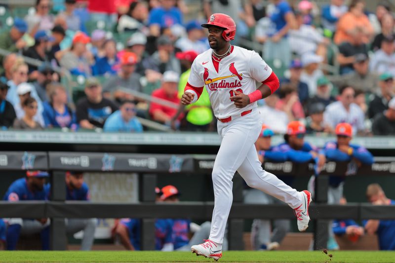 Feb 24, 2025; Jupiter, Florida, USA; St. Louis Cardinals outfielder Jordan Walker (18) scores against the New York Mets during the second inning at Roger Dean Chevrolet Stadium. Mandatory Credit: Sam Navarro-Imagn Images