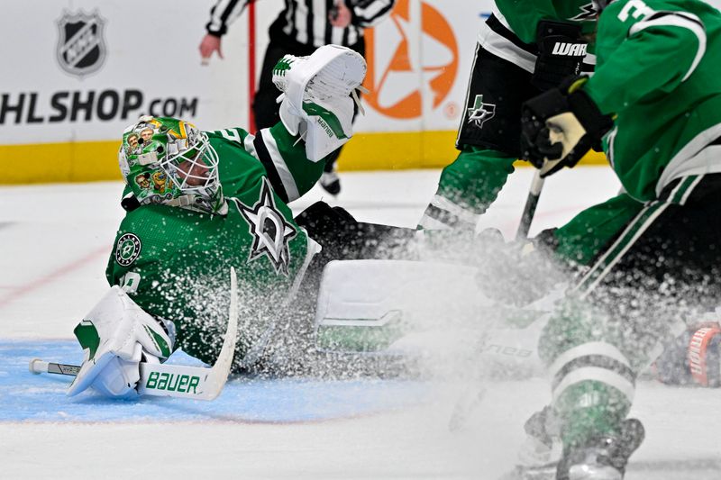 May 23, 2024; Dallas, Texas, USA; Dallas Stars goaltender Jake Oettinger (29) faces the Edmonton Oilers attack during the third period in game one of the Western Conference Final of the 2024 Stanley Cup Playoffs at American Airlines Center. Mandatory Credit: Jerome Miron-USA TODAY Sports