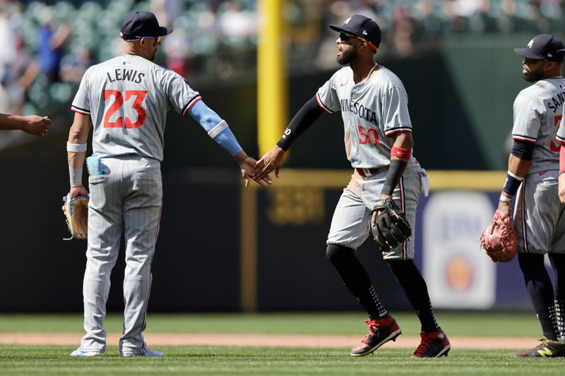 Jun 30, 2024; Seattle, Washington, USA; Minnesota Twins third baseman Royce Lewis (23) greets Minnesota Twins shortstop Willi Castro (50) after the win against the Seattle Mariners’ at T-Mobile Park. Mandatory Credit: John Froschauer-USA TODAY Sports