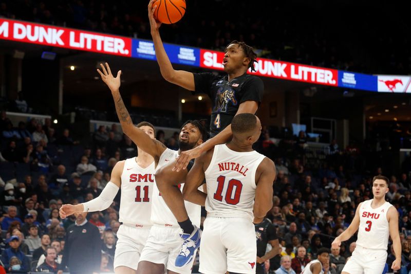 Jan 26, 2023; Memphis, Tennessee, USA; Memphis Tigers forward Chandler Lawson (4) drives to the basket during the first half against the Southern Methodist Mustangs at FedExForum. Mandatory Credit: Petre Thomas-USA TODAY Sports