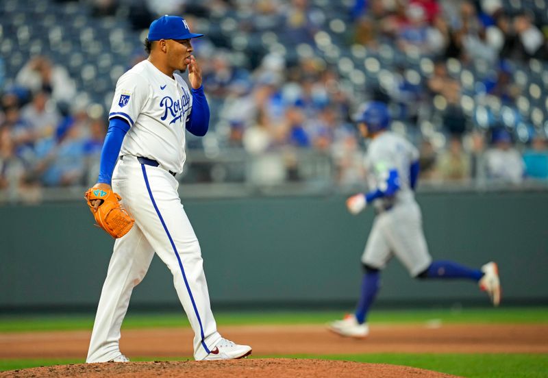 Apr 24, 2024; Kansas City, Missouri, USA; Kansas City Royals pitcher Angel Zerpa (61) reacts after giving up a home run to Toronto Blue Jays outfielder George Springer (4) during the fifth inning at Kauffman Stadium. Mandatory Credit: Jay Biggerstaff-USA TODAY Sports