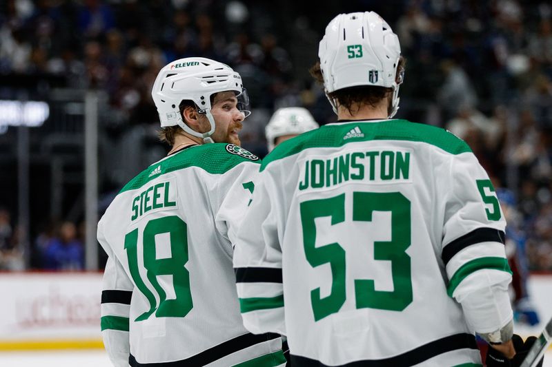 May 13, 2024; Denver, Colorado, USA; Dallas Stars center Sam Steel (18) reacts with center Wyatt Johnston (53) after scoring an empty net goal in the third period against the Colorado Avalanche in game four of the second round of the 2024 Stanley Cup Playoffs at Ball Arena. Mandatory Credit: Isaiah J. Downing-USA TODAY Sports