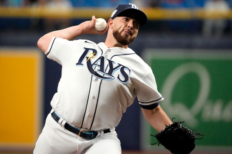 Aug 23, 2023; St. Petersburg, Florida, USA; Tampa Bay Rays starting pitcher Aaron Civale (34) throws a pitch against the Colorado Rockies during the first inning at Tropicana Field. Mandatory Credit: Dave Nelson-USA TODAY Sports