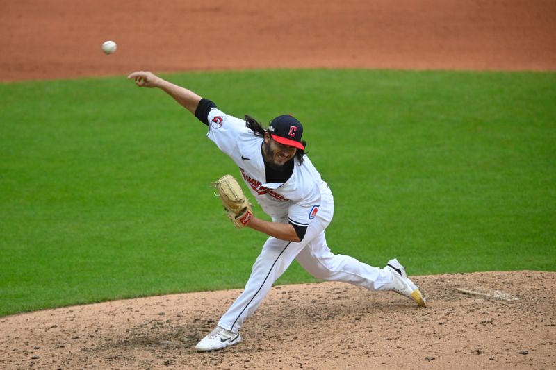 Oct 12, 2024; Cleveland, Ohio, USA; Cleveland Guardians pitcher Eli Morgan (49) pitches in the seventh inning against the Detroit Tigers  during game five of the ALDS for the 2024 MLB Playoffs at Progressive Field. Mandatory Credit: David Richard-Imagn Images