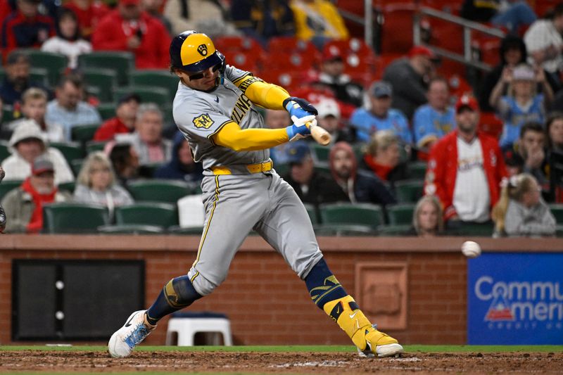 Apr 19, 2024; St. Louis, Missouri, USA; Milwaukee Brewers catcher William Contreras (24) hits an RBI single against the St. Louis Cardinals in the tenth inning at Busch Stadium. Mandatory Credit: Joe Puetz-USA TODAY Sports