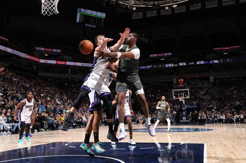 MINNEAPOLIS, MN -  MARCH 1: Naz Reid #11 of the Minnesota Timberwolves passes the ball during the game against the Sacramento Kings on March 1, 2024 at Target Center in Minneapolis, Minnesota. NOTE TO USER: User expressly acknowledges and agrees that, by downloading and or using this Photograph, user is consenting to the terms and conditions of the Getty Images License Agreement. Mandatory Copyright Notice: Copyright 2024 NBAE (Photo by David Sherman/NBAE via Getty Images)