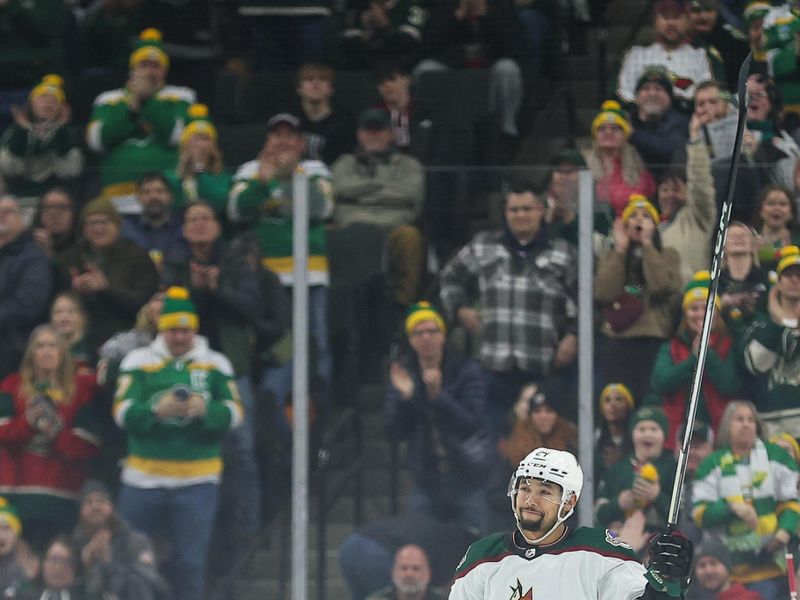 Jan 13, 2024; Saint Paul, Minnesota, USA; Arizona Coyotes defenseman Matt Dumba (24) gestures to the crowd during the first period against the Minnesota Wild at Xcel Energy Center. Mandatory Credit: Matt Krohn-USA TODAY Sports