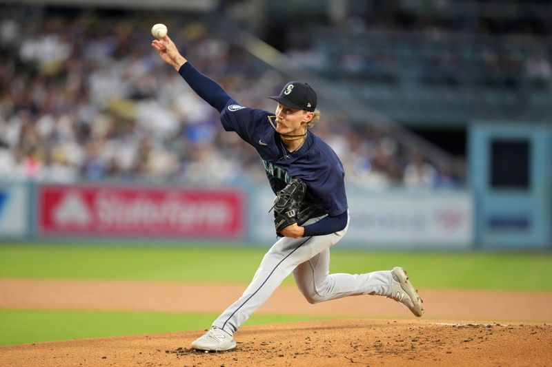 Aug 20, 2024; Los Angeles, California, USA; Los Angeles Dodgers starting pitcher Walker Buehler (21) throws in the third inning against the Seattle Mariners at Dodger Stadium. Mandatory Credit: Kirby Lee-USA TODAY Sports