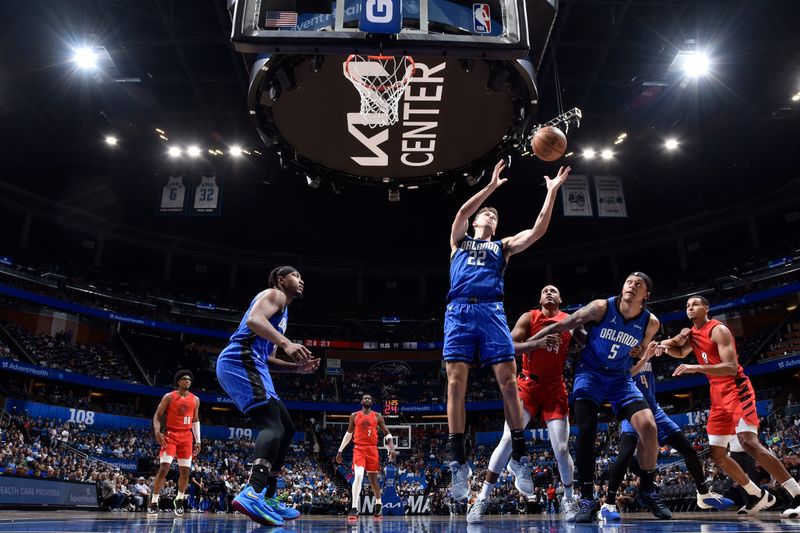 ORLANDO, FL - APRIL 1: Franz Wagner #22 of the Orlando Magic grabs a rebound during the game against the Portland Trail Blazers on April 1, 2024 at Kia Center in Orlando, Florida. NOTE TO USER: User expressly acknowledges and agrees that, by downloading and or using this photograph, User is consenting to the terms and conditions of the Getty Images License Agreement. Mandatory Copyright Notice: Copyright 2024 NBAE (Photo by Fernando Medina/NBAE via Getty Images)