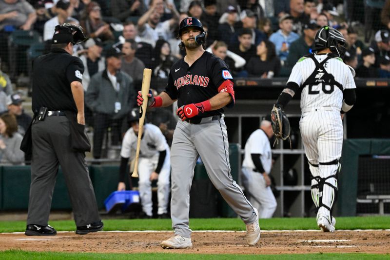 May 10, 2024; Chicago, Illinois, USA;  Cleveland Guardians catcher Austin Hedges (27) strikes out during the fifth inning against the Chicago White Sox at Guaranteed Rate Field. Mandatory Credit: Matt Marton-USA TODAY Sports