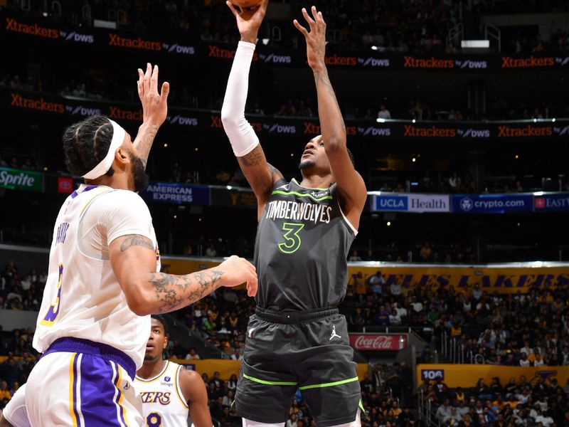 LOS ANGELES, CA - APRIL 7: Jaden McDaniels #3 of the Minnesota Timberwolves shoots the ball during the game against the Los Angeles Lakers on April 7, 2024 at Crypto.Com Arena in Los Angeles, California. NOTE TO USER: User expressly acknowledges and agrees that, by downloading and/or using this Photograph, user is consenting to the terms and conditions of the Getty Images License Agreement. Mandatory Copyright Notice: Copyright 2024 NBAE (Photo by Juan Ocampo/NBAE via Getty Images)