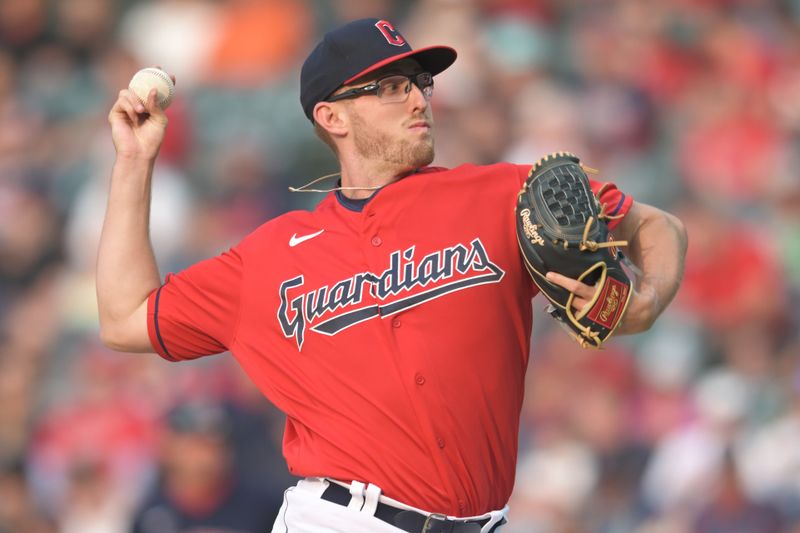 Jun 7, 2023; Cleveland, Ohio, USA; Cleveland Guardians starting pitcher Tanner Bibee (61) throws a pitch during the first inning against the Boston Red Sox at Progressive Field. Mandatory Credit: Ken Blaze-USA TODAY Sports