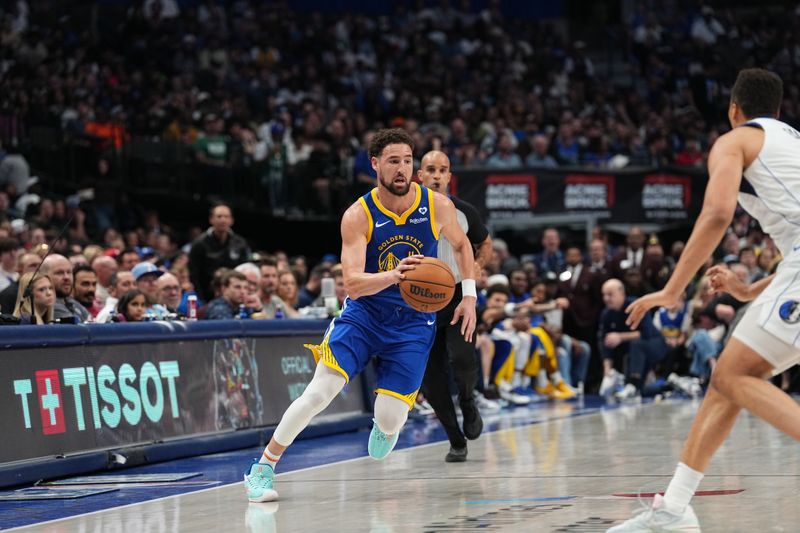 DALLAS, TX - MARCH 13: Klay Thompson #11 of the Golden State Warriors handles the ball during the game against the Dallas Mavericks on March 13, 2024 at the American Airlines Center in Dallas, Texas. NOTE TO USER: User expressly acknowledges and agrees that, by downloading and or using this photograph, User is consenting to the terms and conditions of the Getty Images License Agreement. Mandatory Copyright Notice: Copyright 2024 NBAE (Photo by Glenn James/NBAE via Getty Images)