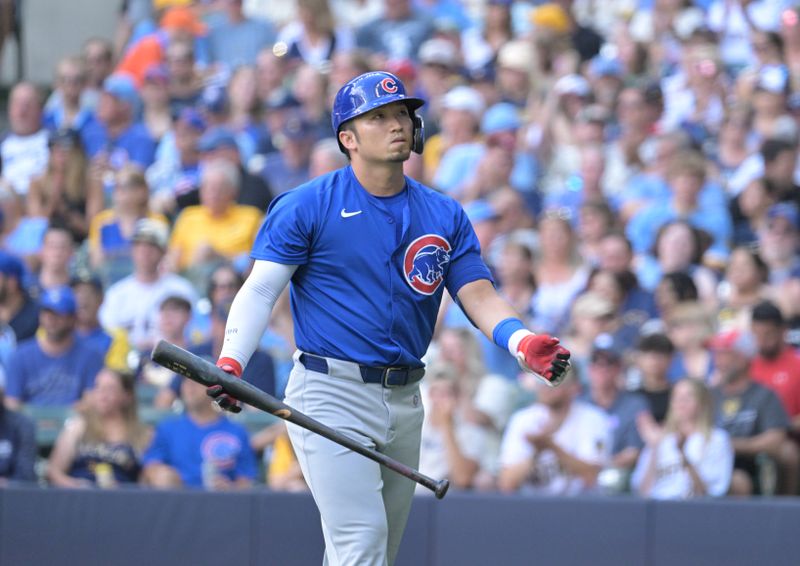 Jun 29, 2024; Milwaukee, Wisconsin, USA; Chicago Cubs outfielder Seiya Suzuki (27) strikes out swinging agaiinst the Milwaukee Brewers in the third inning at American Family Field. Mandatory Credit: Michael McLoone-USA TODAY Sports