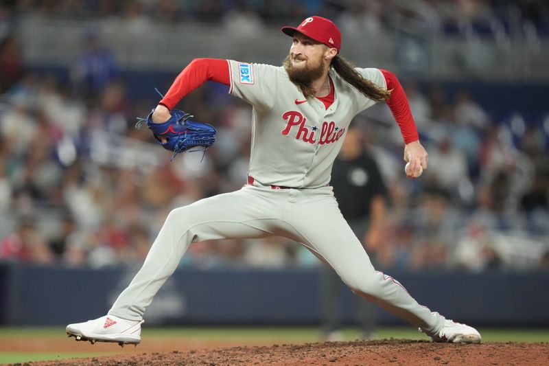 Sep 6, 2025; Miami, Florida, USA;  Philadelphia Phillies pitcher Matt Strahm (25) pitches in the eighth inning against the Miami Marlins at loanDepot Park. Mandatory Credit: Jim Rassol-Imagn Images