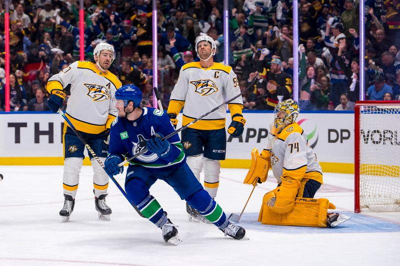 Apr 21, 2024; Vancouver, British Columbia, CAN; Nashville Predators defenseman Ryan McDonagh (27) and defenseman Roman Josi (59) and goalie Juuse Saros (74) and Vancouver Canucks forward J.T. Miller (9) all react after defenseman Quinn Hughes (43) scored on Saros in the third period in game one of the first round of the 2024 Stanley Cup Playoffs at Rogers Arena. Mandatory Credit: Bob Frid-USA TODAY Sports