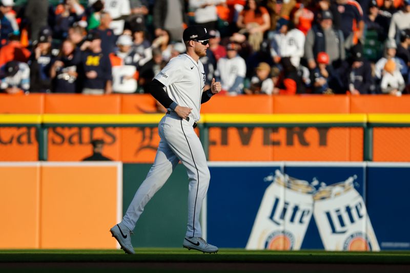 Oct 10, 2024; Detroit, Michigan, USA; Detroit Tigers outfielder Parker Meadows (22) warms up before the game against the Cleveland Guardians during game four of the ALDS for the 2024 MLB Playoffs at Comerica Park. Mandatory Credit: Rick Osentoski-Imagn Images