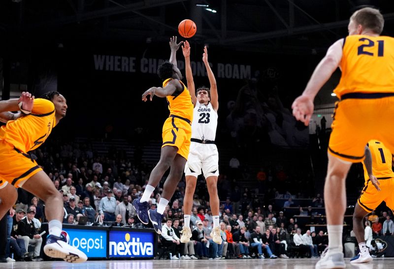 Feb 2, 2023; Boulder, Colorado, USA; Colorado Buffaloes forward Tristan da Silva (23) shoots over California Golden Bears forward Sam Alajiki (24) in the first half at the CU Events Center. Mandatory Credit: Ron Chenoy-USA TODAY Sports