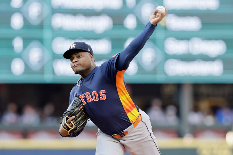 Jul 20, 2024; Seattle, Washington, USA; Houston Astros starting pitcher Framber Valdez (59) throws against the Seattle Mariners during the first inning at T-Mobile Park. Mandatory Credit: John Froschauer-USA TODAY Sports