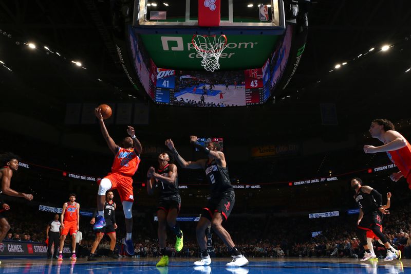 OKLAHOMA CITY, OK - MARCH 27:  Cason Wallace #22 of the Oklahoma City Thunder  drives to the basket during the game against the Houston Rockets on March 27, 2024 at Paycom Arena in Oklahoma City, Oklahoma. NOTE TO USER: User expressly acknowledges and agrees that, by downloading and or using this photograph, User is consenting to the terms and conditions of the Getty Images License Agreement. Mandatory Copyright Notice: Copyright 2024 NBAE (Photo by Zach Beeker/NBAE via Getty Images)