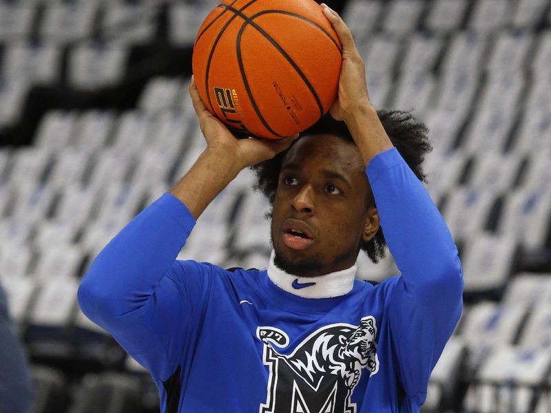 Dec 3, 2022; Memphis, Tennessee, USA; Memphis Tigers forward DeAndre Williams (12) shoots during warm ups prior to the game against the Mississippi Rebels at FedExForum. Mandatory Credit: Petre Thomas-USA TODAY Sports