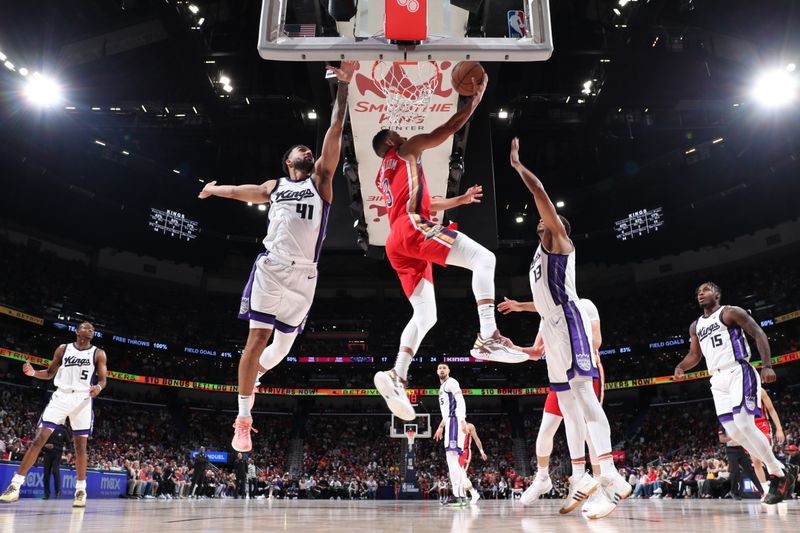 NEW ORLEANS, LA - APRIL 19:  CJ McCollum #3 of the New Orleans Pelicans goes to the basket during the game against the Sacramento Kings during the 2024 Play-In Tournament on April 19, 2024 at the Smoothie King Center in New Orleans, Louisiana. NOTE TO USER: User expressly acknowledges and agrees that, by downloading and or using this Photograph, user is consenting to the terms and conditions of the Getty Images License Agreement. Mandatory Copyright Notice: Copyright 2024 NBAE (Photo by Jeff Haynes./NBAE via Getty Images)