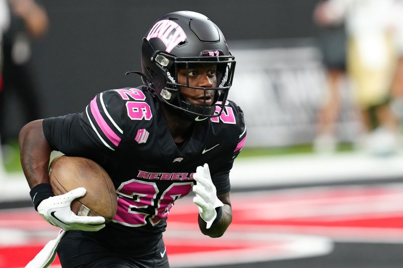 Oct 21, 2023; Paradise, Nevada, USA; UNLV Rebels running back Courtney Reese (26) warms up before a game against the Colorado State Rams at Allegiant Stadium. Mandatory Credit: Stephen R. Sylvanie-USA TODAY Sports