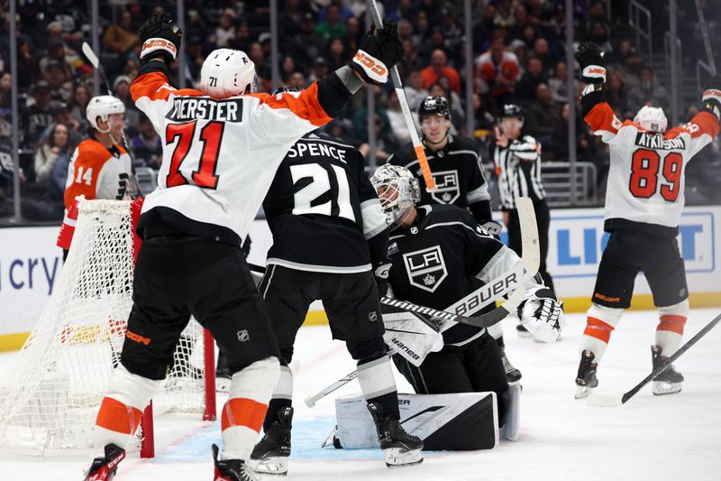 Nov 11, 2023; Los Angeles, California, USA;  Philadelphia Flyers right wing Cam Atkinson (89) and right wing Tyson Foerster (71) celebrate after Atkinson scores a goal during the third period against the Los Angeles Kings at Crypto.com Arena. Mandatory Credit: Kiyoshi Mio-USA TODAY Sports