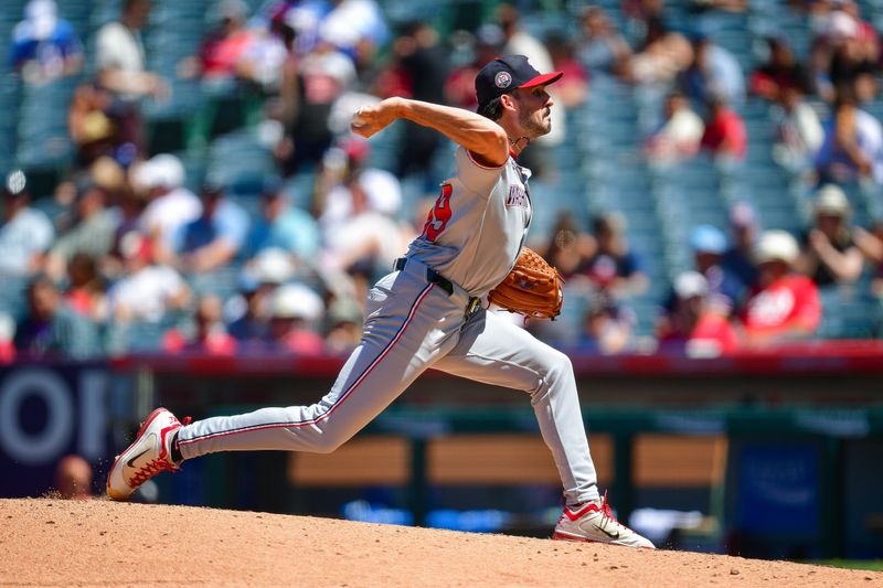Jun 29, 2025; Anaheim, California, USA; Washington Nationals pitcher Cole Henry (99) throws against the Los Angeles Angels during the sixth inning at Angel Stadium. Mandatory Credit: Gary A. Vasquez-Imagn Images