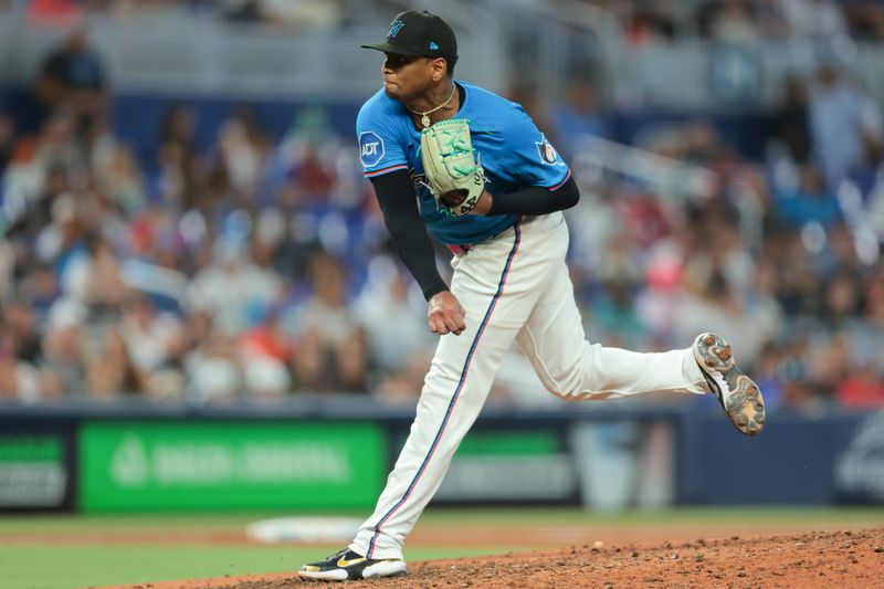 Sep 28, 2025; Miami, Florida, USA; Miami Marlins starting pitcher Edward Cabrera (27) delivers a pitch against the New York Mets during the fifth inning at loanDepot Park. Mandatory Credit: Sam Navarro-Imagn Images
