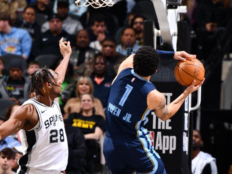 SAN ANTONIO, TX - JANUARY 17: Scotty Pippen Jr. #1 of the Memphis Grizzlies drives to the basket during the game against the San Antonio Spurs on January 17, 2025 at the Frost Bank Center in San Antonio, Texas. NOTE TO USER: User expressly acknowledges and agrees that, by downloading and or using this photograph, user is consenting to the terms and conditions of the Getty Images License Agreement. Mandatory Copyright Notice: Copyright 2025 NBAE (Photos by Barry Gossage/NBAE via Getty Images)